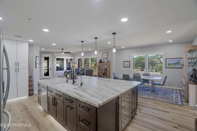 Experience elevated, low-maintenance living in the prestigious - photo 6