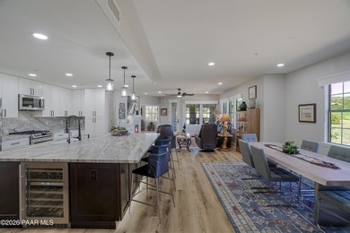 Experience elevated, low-maintenance living in the prestigious - photo 7