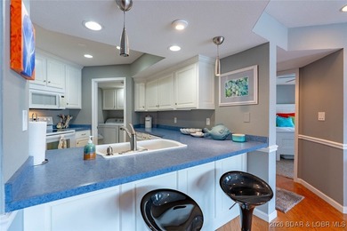 Check this beauty out! This well-cared-for, urn-key unit - photo 9