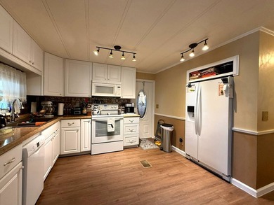 Welcome to Lot 26 in Pegel Point Estates, a hidden gem on the - photo 5