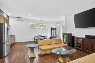 TWO HOMES-ONE OCEANFRONT PROPERTY: Set along the shores of - photo 34