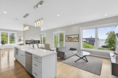 TWO HOMES-ONE OCEANFRONT PROPERTY: Set along the shores of - photo 47