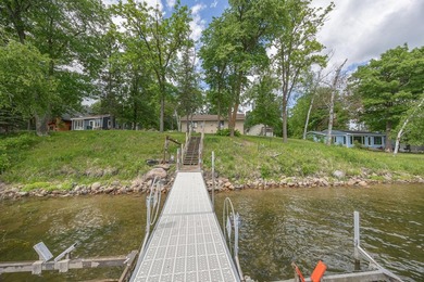 Here's your opportunity to enjoy 100' of shoreline on Woman Lake - photo 3