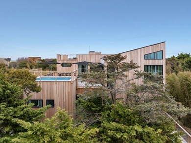 Discover the future of coastal living at this breathtaking new - photo 1