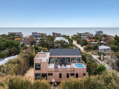 Discover the future of coastal living at this breathtaking new - photo 3