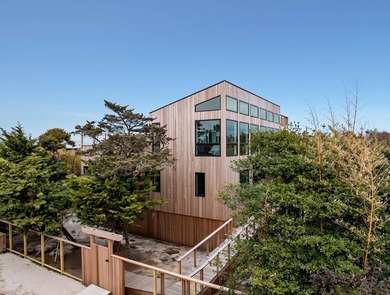 Discover the future of coastal living at this breathtaking new - photo 4