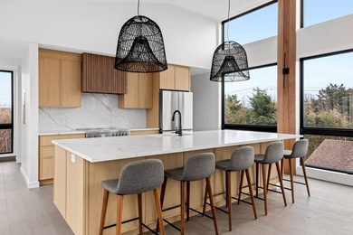 Discover the future of coastal living at this breathtaking new - photo 6