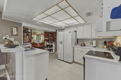 Welcome to this spacious 4-bedroom, 2.5-bath pool home located - photo 16