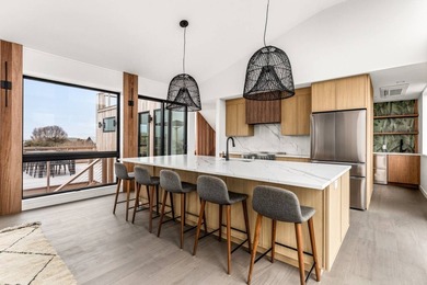 Discover the future of coastal living at this breathtaking new - photo 7