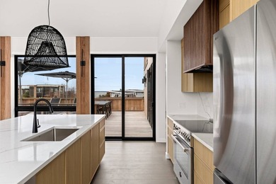 Discover the future of coastal living at this breathtaking new - photo 9