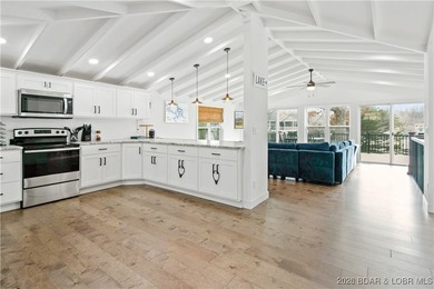 Fully renovated lake home in a prime Lake Ozark location at the - photo 3