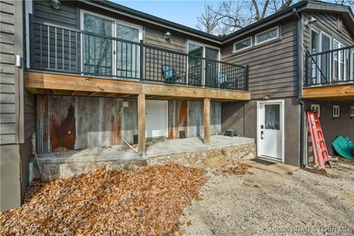 Fully renovated lake home in a prime Lake Ozark location at the - photo 7