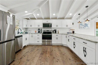 Fully renovated lake home in a prime Lake Ozark location at the - photo 8