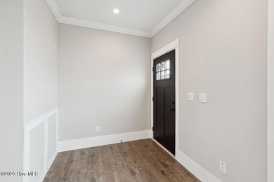 Welcome to 107 Blades Village Drive, a beautifully designed - photo 3