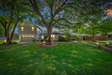 Welcome to a beautifully updated Grapevine home where generous - photo 3