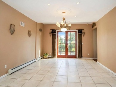 Welcome to this exceptional, oversized two-family residence in - photo 12