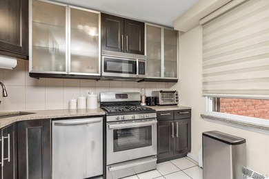 Welcome to Residence 6A at Park Plaza, a sun-filled 2-bedroom - photo 13
