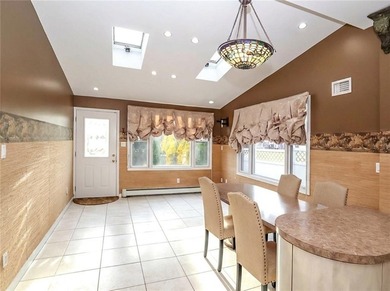 Welcome to this exceptional, oversized two-family residence in - photo 17