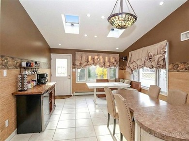 Welcome to this exceptional, oversized two-family residence in - photo 18