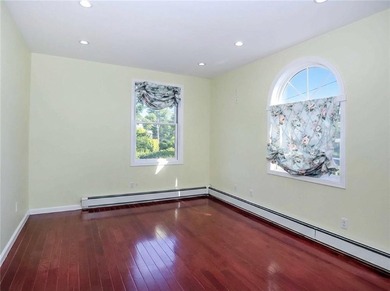 Welcome to this exceptional, oversized two-family residence in - photo 26