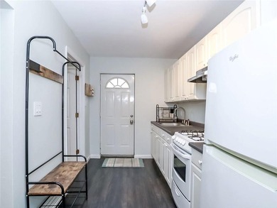 Welcome to this exceptional, oversized two-family residence in - photo 36