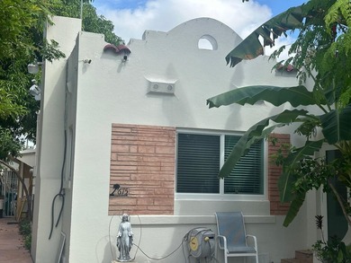 This rare find includes a single-family home with two detached - photo 2