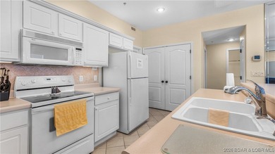 Wow! What a View! Ride the elevator to a SUPER CLEAN lakefront