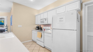 Wow! What a View! Ride the elevator to a SUPER CLEAN lakefront