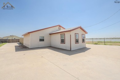 Rare in-town waterfront opportunity! This unique property offers - photo 3