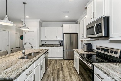 WELCOME TO CAMBRIDGE PARK! Step inside this all brick home and - photo 8