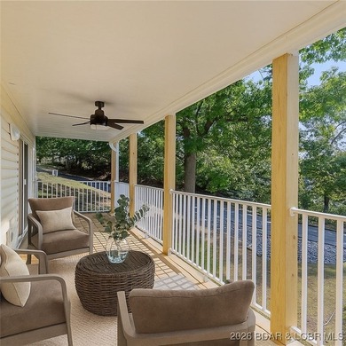 This inviting 3-bed, 2-bath main-level condo sits in The Ledges - photo 2