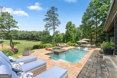 AR Homes built this custom residence around one of Chattahoochee - photo 4