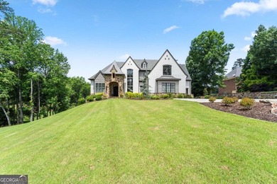 AR Homes built this custom residence around one of Chattahoochee - photo 6