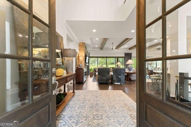 AR Homes built this custom residence around one of Chattahoochee - photo 8