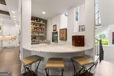 AR Homes built this custom residence around one of Chattahoochee - photo 10