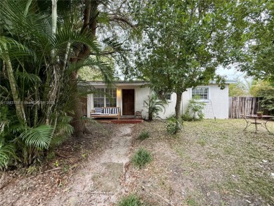 Lake Home For Sale in West Park, Florida