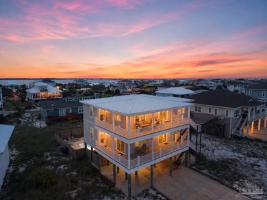 HIGH-YIELD TURNKEY ASSET: 6-Bedroom Gulf-View Revenue Generator! - photo 1