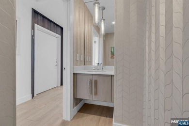 Private elevator entry opens directly into Residence 305, where - photo 17