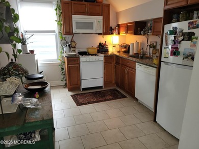 Beautifully renovated and maintained 5-unit apartment building - photo 18