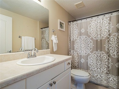 Charming top-floor condo nestled among the treetops! Bright + - photo 22