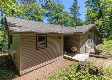 Discover a rare gem on the pristine shores of Vandercook Lake in - photo 36