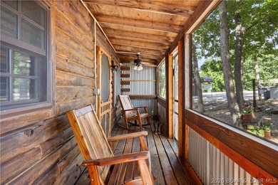 Escape to this adorable 2-bed, 2-bath rustic log cabin tucked - photo 3