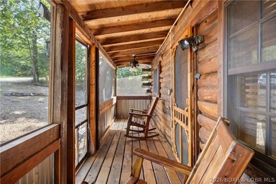 Escape to this adorable 2-bed, 2-bath rustic log cabin tucked - photo 4