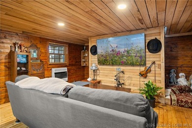 Escape to this adorable 2-bed, 2-bath rustic log cabin tucked - photo 7