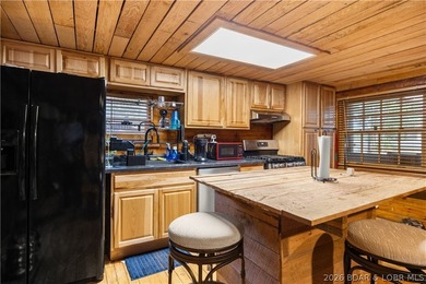 Escape to this adorable 2-bed, 2-bath rustic log cabin tucked - photo 10