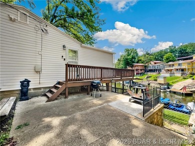 This lake home has it all for 1 price - Boat, 2 PWC's, Paddle - photo 5
