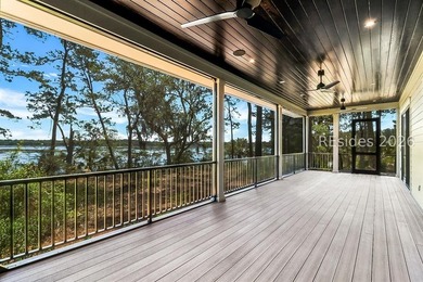 A different rhythm takes hold at Callawassie Island, a canopy of - photo 18
