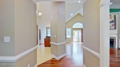 Discover refined coastal living in this beautifully maintained - photo 8