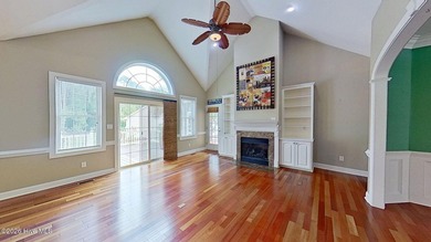 Discover refined coastal living in this beautifully maintained - photo 9