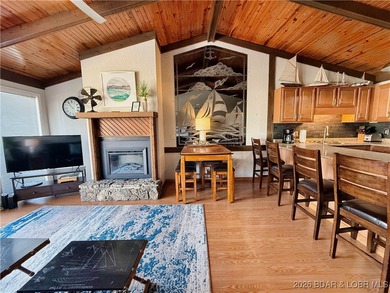 Enjoy lake living at its best in this beautifully maintained